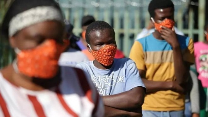 L&#039;Oms recommande désormais le port du masque en public